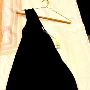 Perfect Party Dress! One shoulder, black midi dress with side ruching from.